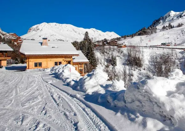 chalets sous la neige